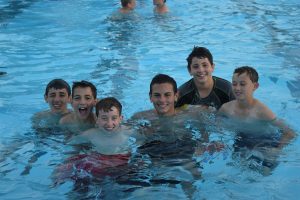 kids in pool during summer