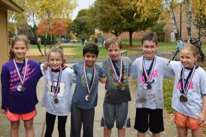 children with medals after ocr