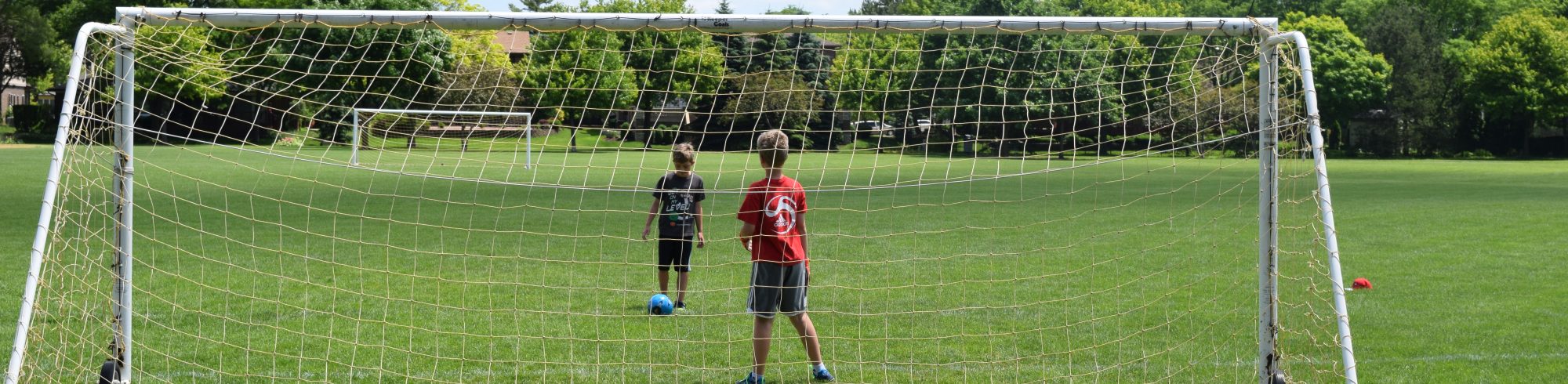 kids playing outdoor soccer