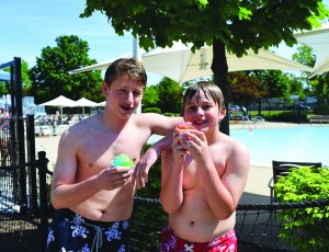 kids enjoying snocones at pool