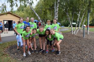 kids running in obstacle course race having fun