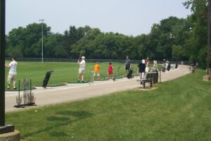 picture of people using the driving range