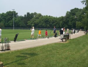 picture of people using the driving range