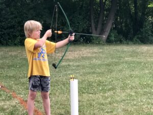boy on archery range