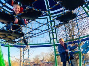 kids playing on burning bush park playground