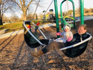 picture of family on swings