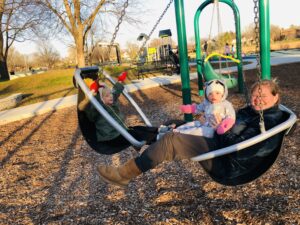 picture of family on swings